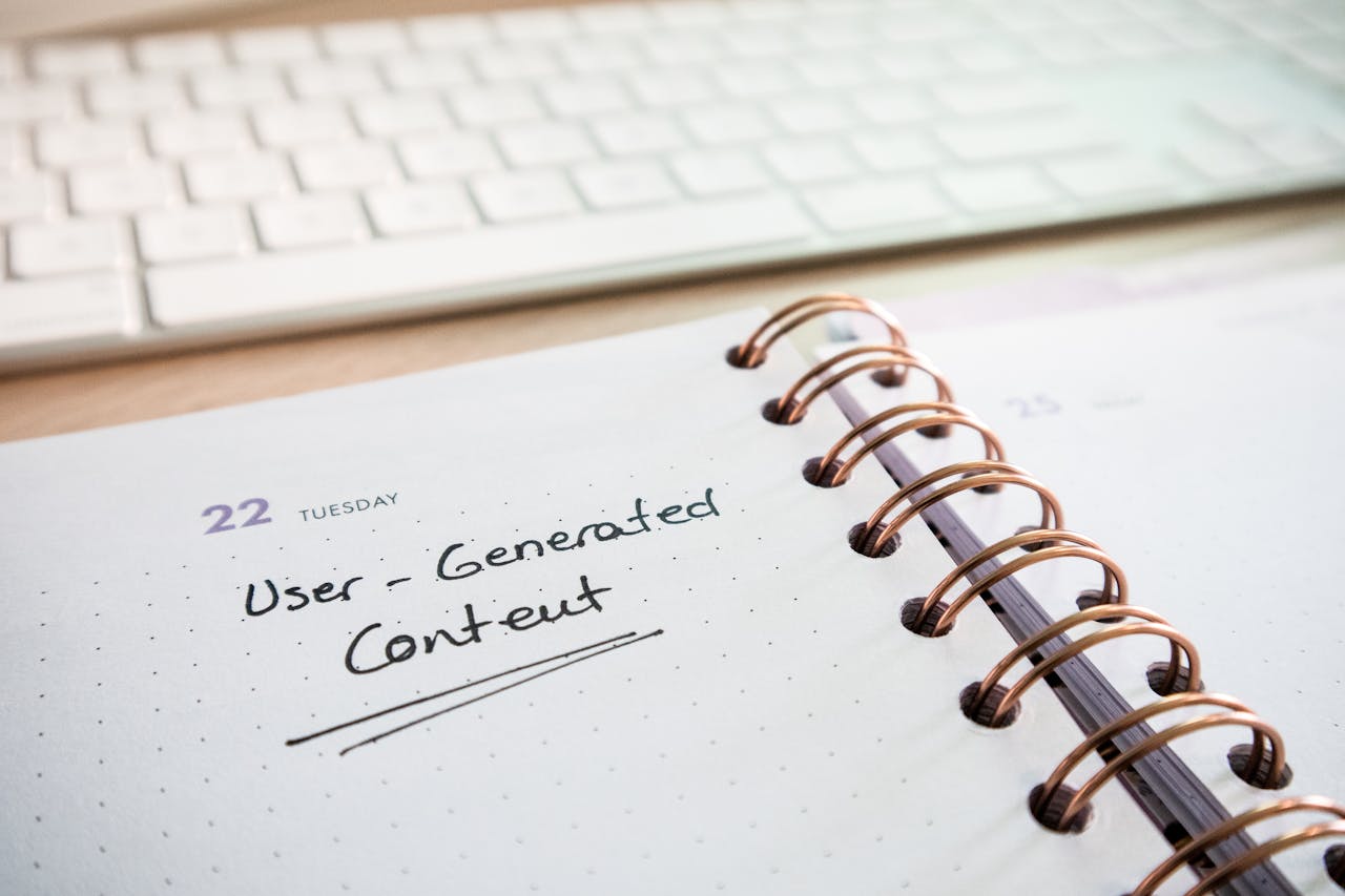gallery-3 Notebook with user-generated content note and keyboard, ideal for planning and productivity.